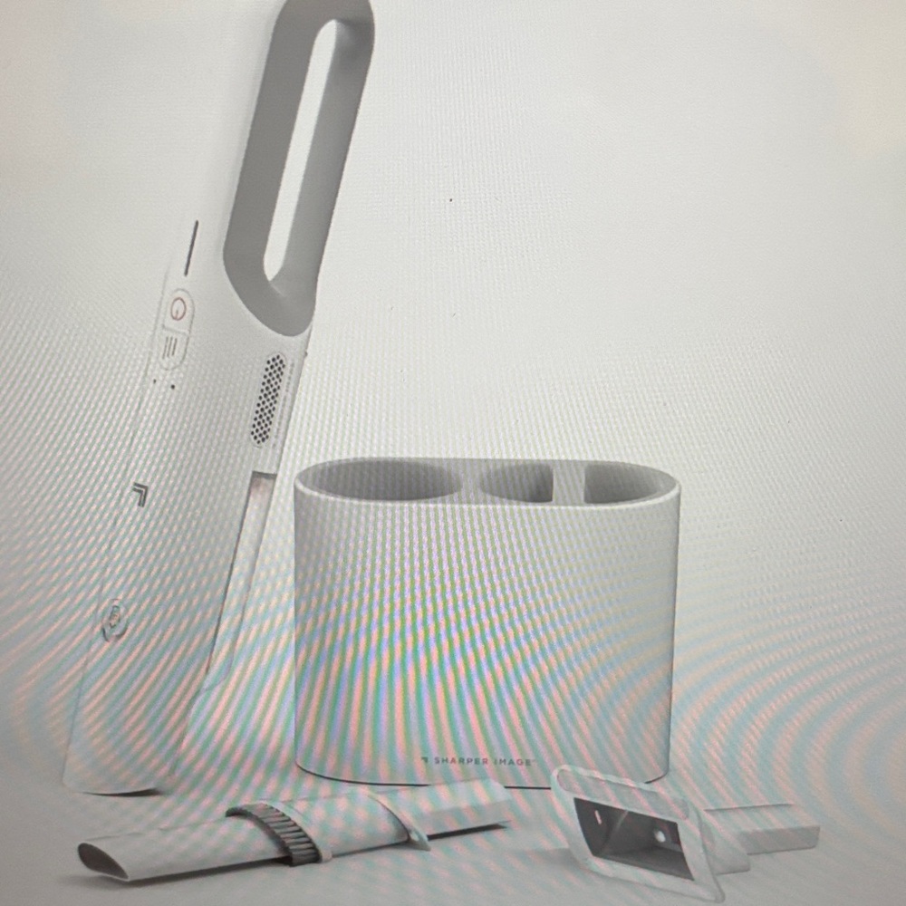 Sharper Image cordless hand-held vacuum